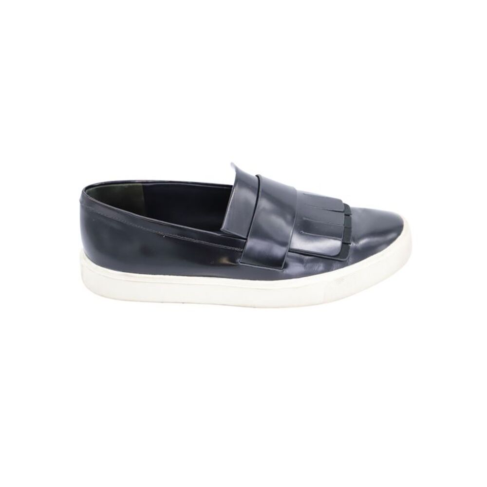 Vince Conventry Kiltie Fringe Slip-On Sneakers in Black Leather